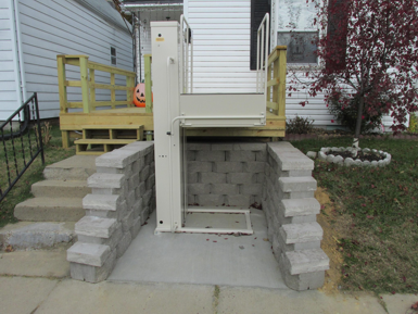 The Mac's Lift PL-50 easily raises to porch level